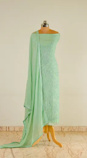 Hand-Embroidered Coral Green Organza Suit with Jaal Pattern