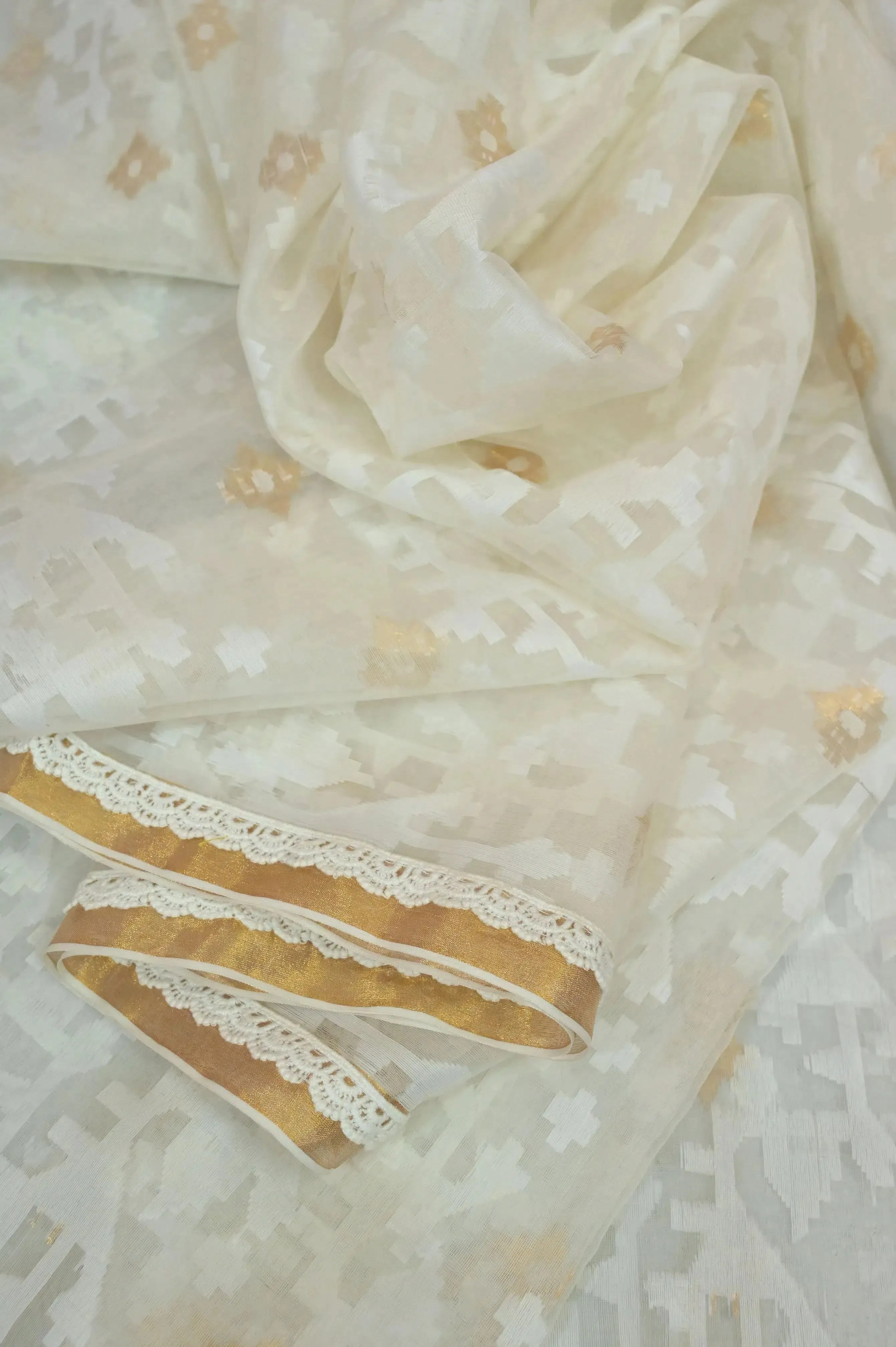 Offwhite Color Muslin Jamdani Saree with Allover Self Jamdani Weaving and Buti Work