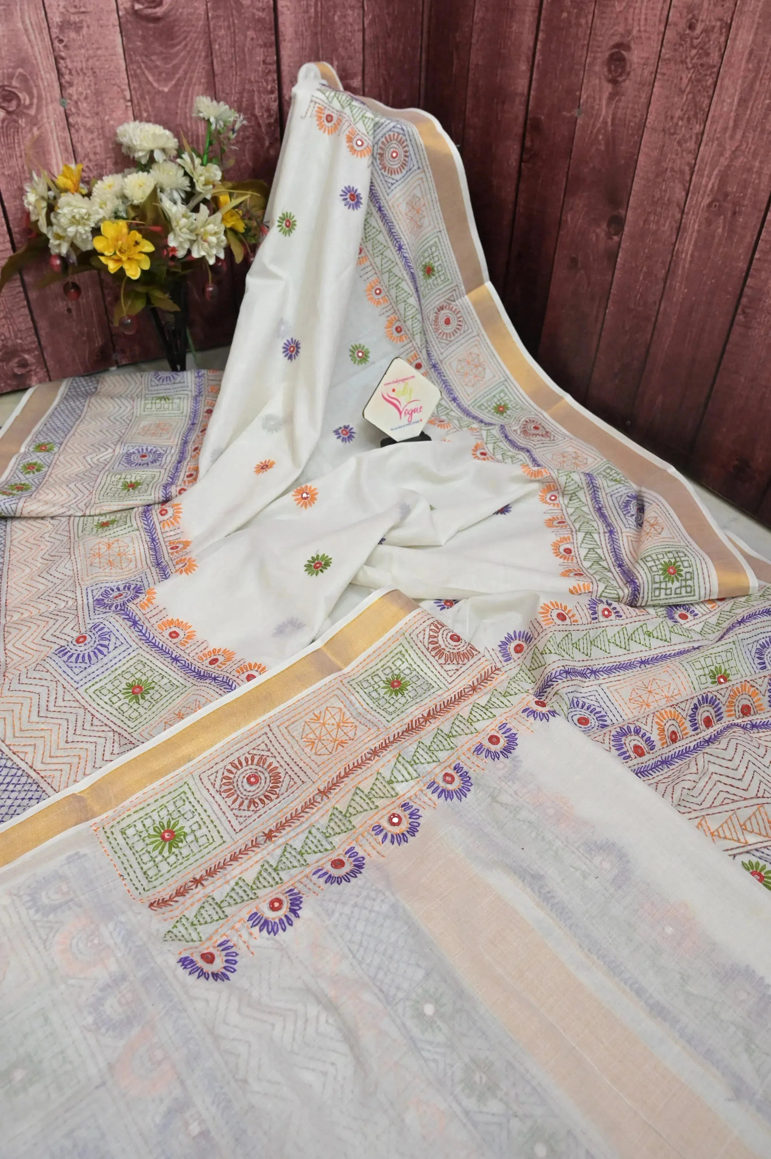 Pearl White Color Kerala Cotton Saree with Hand Lambani and Mirror Work